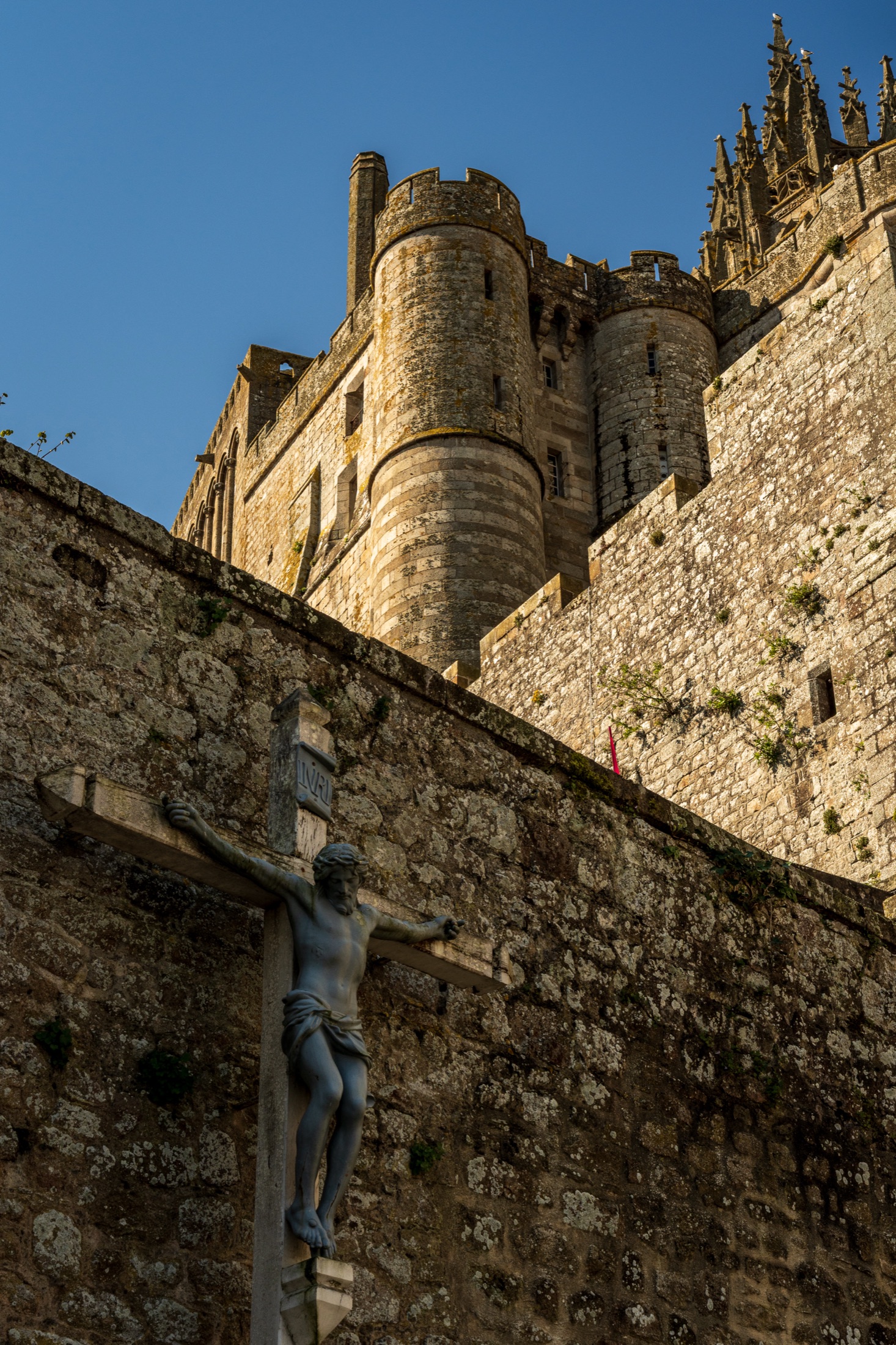 Mont Saint-Michel abbey in morning mist